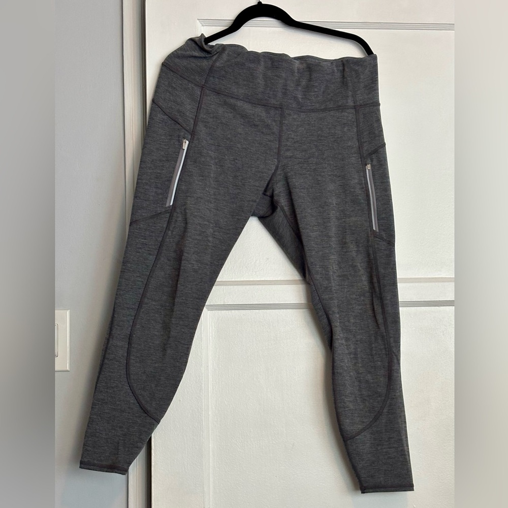 Athleta Gray Leggings with Zipper Pockets and drawstring waist.